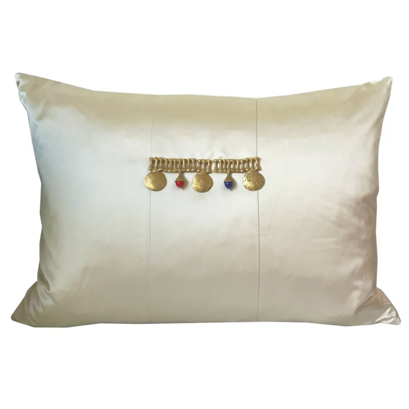 Ann Gish Middle Kingdom pillow in champagne silk with gold coin and jewel tassel trim.