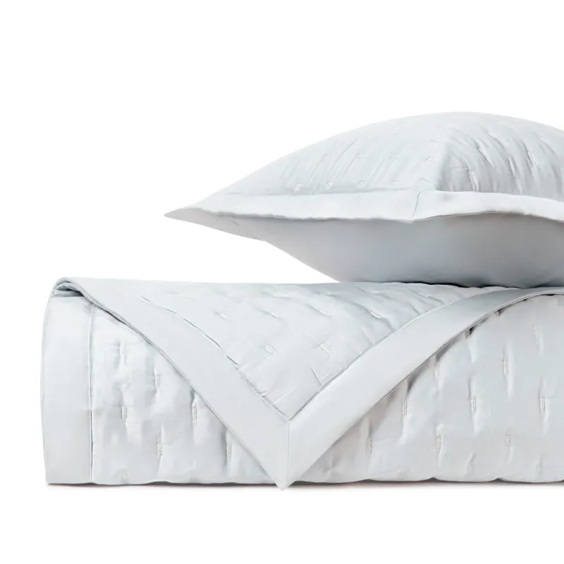 Home Treasures Fil Coupé Modal quilted coverlet in white with textured woven pattern.